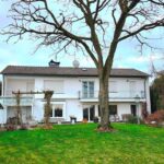 Gesamtansicht des Einfamilienhauses in Iserlohn Hennen vom Garten aus gesehen. Dieses Haus verkauft WZ-Immobilien in Iserlohn.